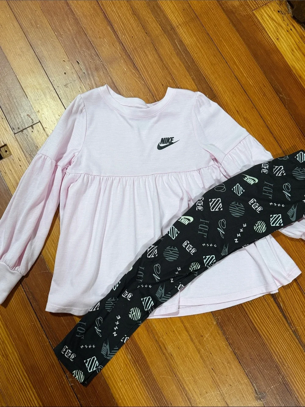 Nike Pink Ruffle-Detail Long Sleeve Top with Black Patterned Leggings